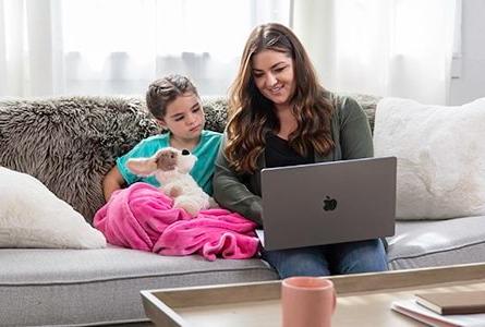 Mom and daughter on computer